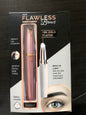 LED eyebrow trimmer with 18K gold-plated head for painless shaping