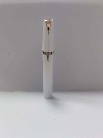 LED eyebrow trimmer with 18K gold-plated head for painless shaping